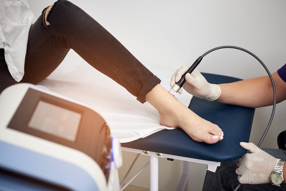 MLS laser therapy being applied to foot and ankle